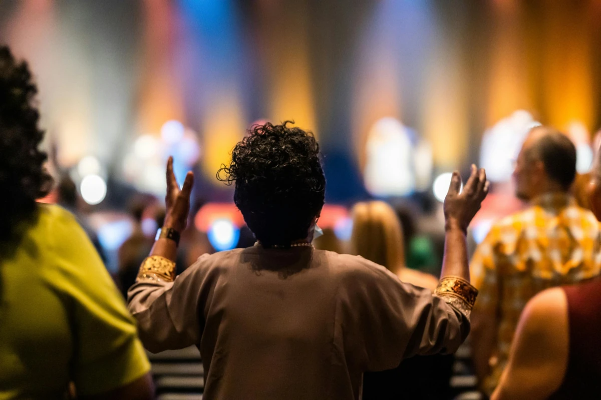 Woman Praising At Castleton Church Of The Nazarene Church In Indianapolis, IN